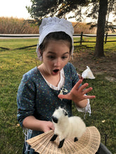 Load image into Gallery viewer, Polonaise gown in blue with green leaves. Girl holding a toy sheep on a fan.