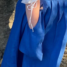 Load image into Gallery viewer, blue linen pocket being worn by girl