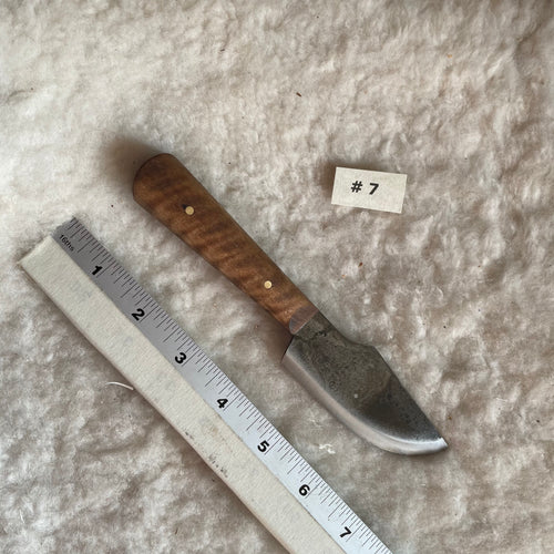 Jeff White Knife #7, Thumb Skinner with a Curly Maple Handle. 